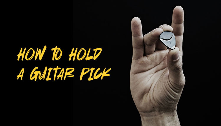 how to hold a guitar pick