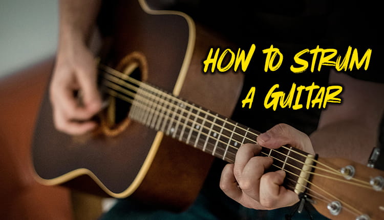 how to strum a guitar